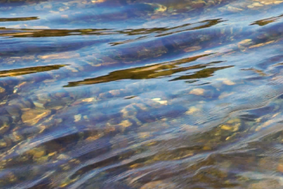 water over pebbles